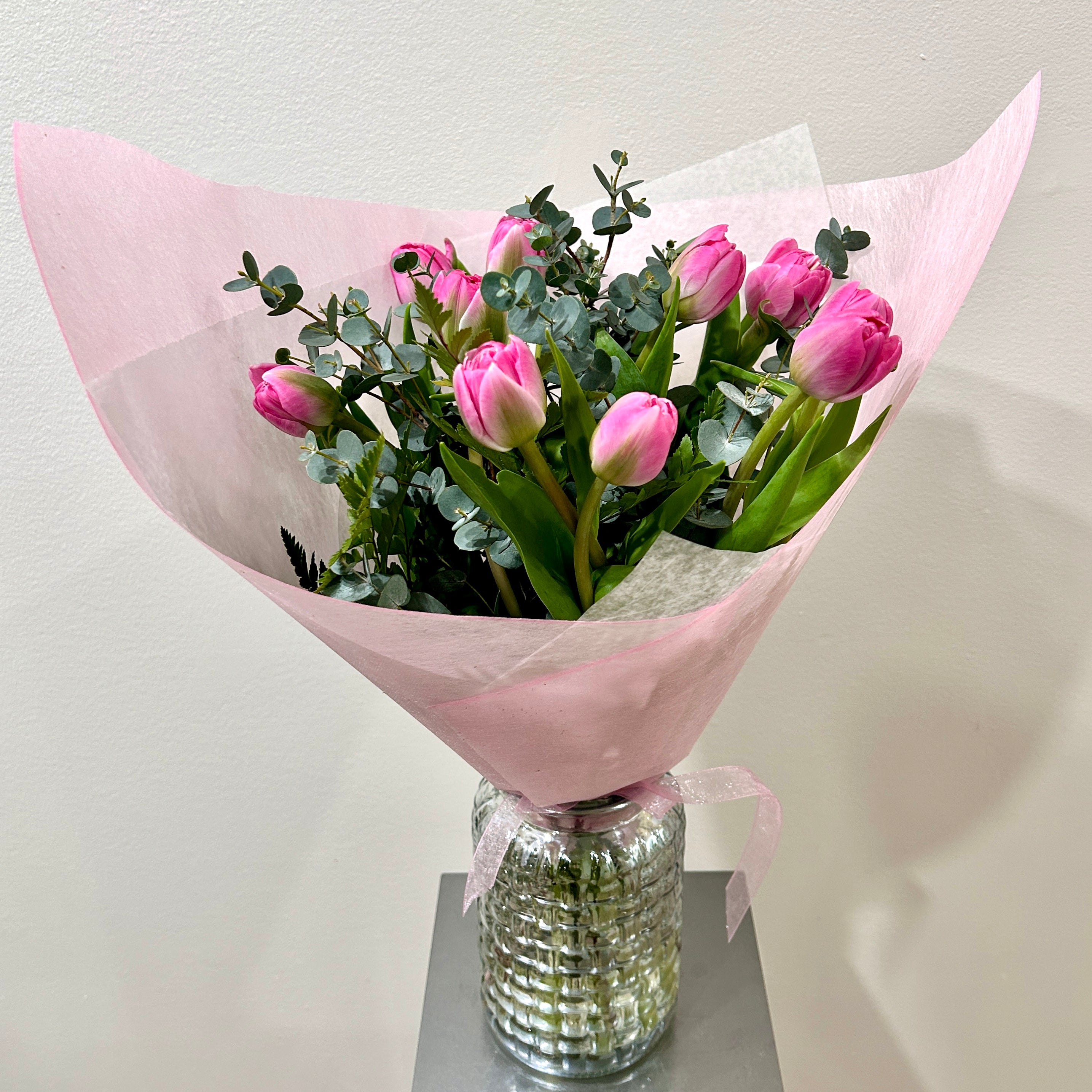 Pink tulips and eucalyptus